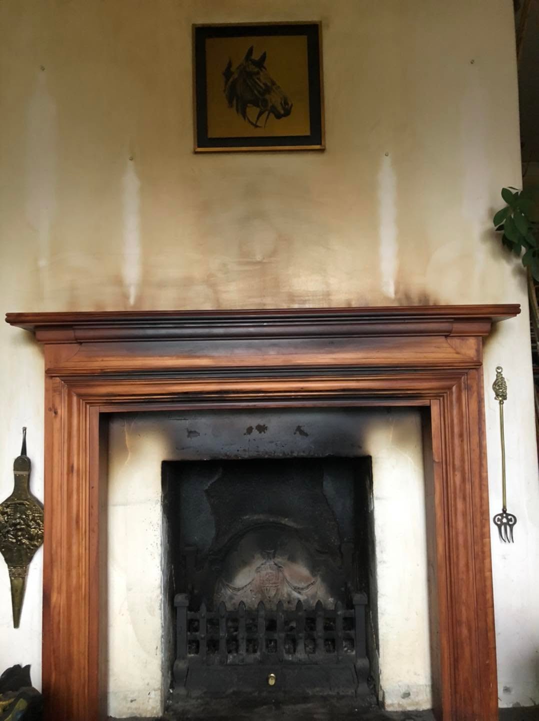 Open fireplace with a timber surround